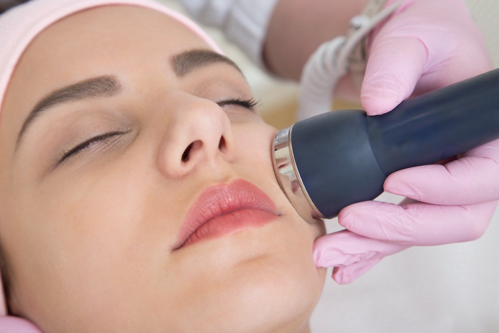 young woman receiving ultherapy treatment