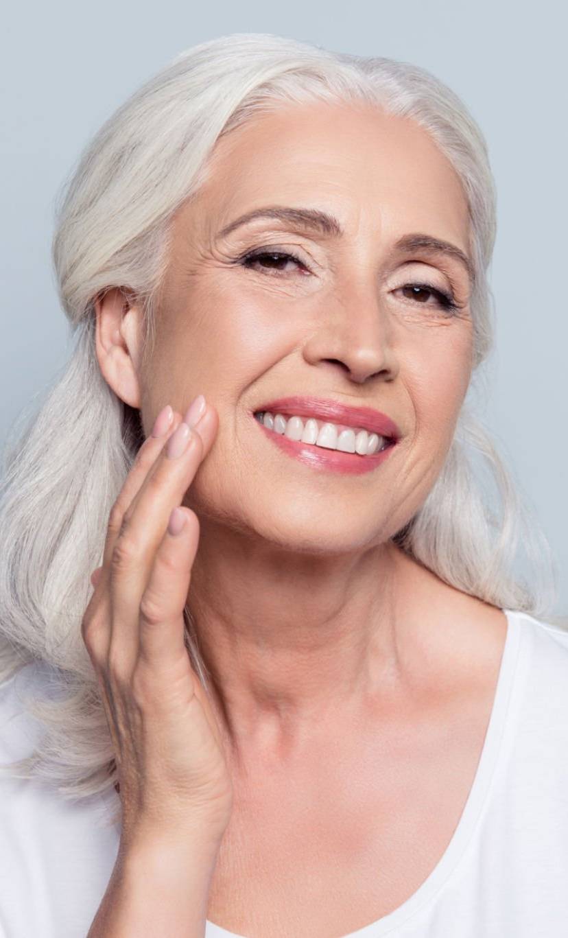 woman looking at camera on green background